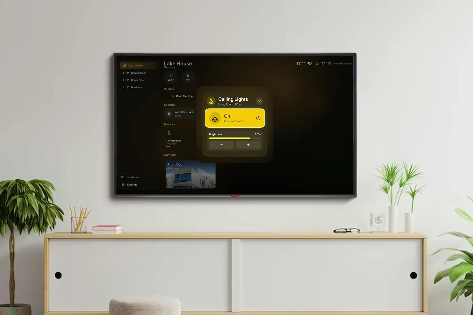 The HomeDeck dashboard on a TV with a Ceiling Lights card open over it: Living Room, 80 percent, a yellow On button labelled Press to Turn Off, and a Brightness bar at 80 percent with minus and plus buttons